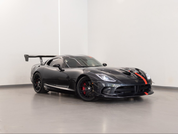 دودج  فايبر  جي تي اس  2014  عادي  30,300 كم  10 سلندر  دفع خلفي  كوبيه \ سبورت  أسود