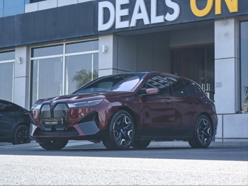 BMW  IX  40  2022  Automatic  77,000 Km  0 Cylinder  All Wheel Drive (AWD)  SUV  Maroon