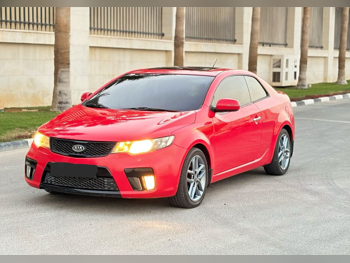 Kia  Cerato  Koup  2013  Automatic  203,000 Km  4 Cylinder  Front Wheel Drive (FWD)  Sedan  Red