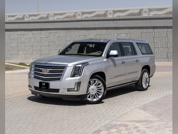 Cadillac  Escalade  Platinum  2018  Automatic  153,000 Km  8 Cylinder  Four Wheel Drive (4WD)  SUV  Silver