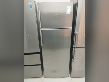 بوش  ثلاجة بفريزر علوي  - فضي