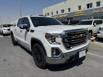 GMC  Sierra  SLT  2020  Automatic  61,000 Km  8 Cylinder  Four Wheel Drive (4WD)  Pick Up  White
