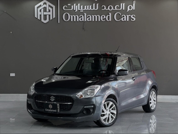 Suzuki  Swift  2022  Automatic  121,000 Km  4 Cylinder  Front Wheel Drive (FWD)  Hatchback  Gray