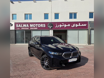 BMW  X-Series  X6  2024  Automatic  22,000 Km  6 Cylinder  Four Wheel Drive (4WD)  SUV  Black  With Warranty