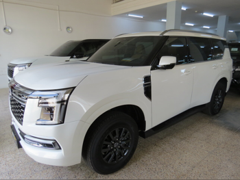 Nissan  Patrol  Titanium  2025  Automatic  7,000 Km  6 Cylinder  Four Wheel Drive (4WD)  SUV  White  With Warranty