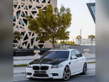 BMW  M-Series  5  2013  Automatic  149,000 Km  8 Cylinder  Rear Wheel Drive (RWD)  Sedan  White  With Warranty