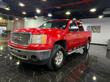 GMC  Sierra  SLE  2010  Automatic  146,000 Km  8 Cylinder  Four Wheel Drive (4WD)  Pick Up  Red