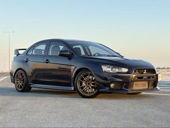 Mitsubishi  Lancer  Evolution MR  2013  Manual  40,000 Km  4 Cylinder  Front Wheel Drive (FWD)  Sedan  Dark Blue