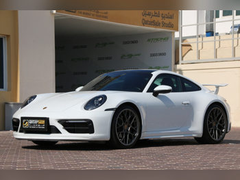 Porsche  911  Carrera  2022  Automatic  46,000 Km  6 Cylinder  Rear Wheel Drive (RWD)  Coupe / Sport  White  With Warranty