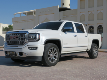 جي ام سي  سييرا  دينالي  2018  اوتوماتيك  215,689 كم  8 سلندر  دفع رباعي  اس يو في  أبيض