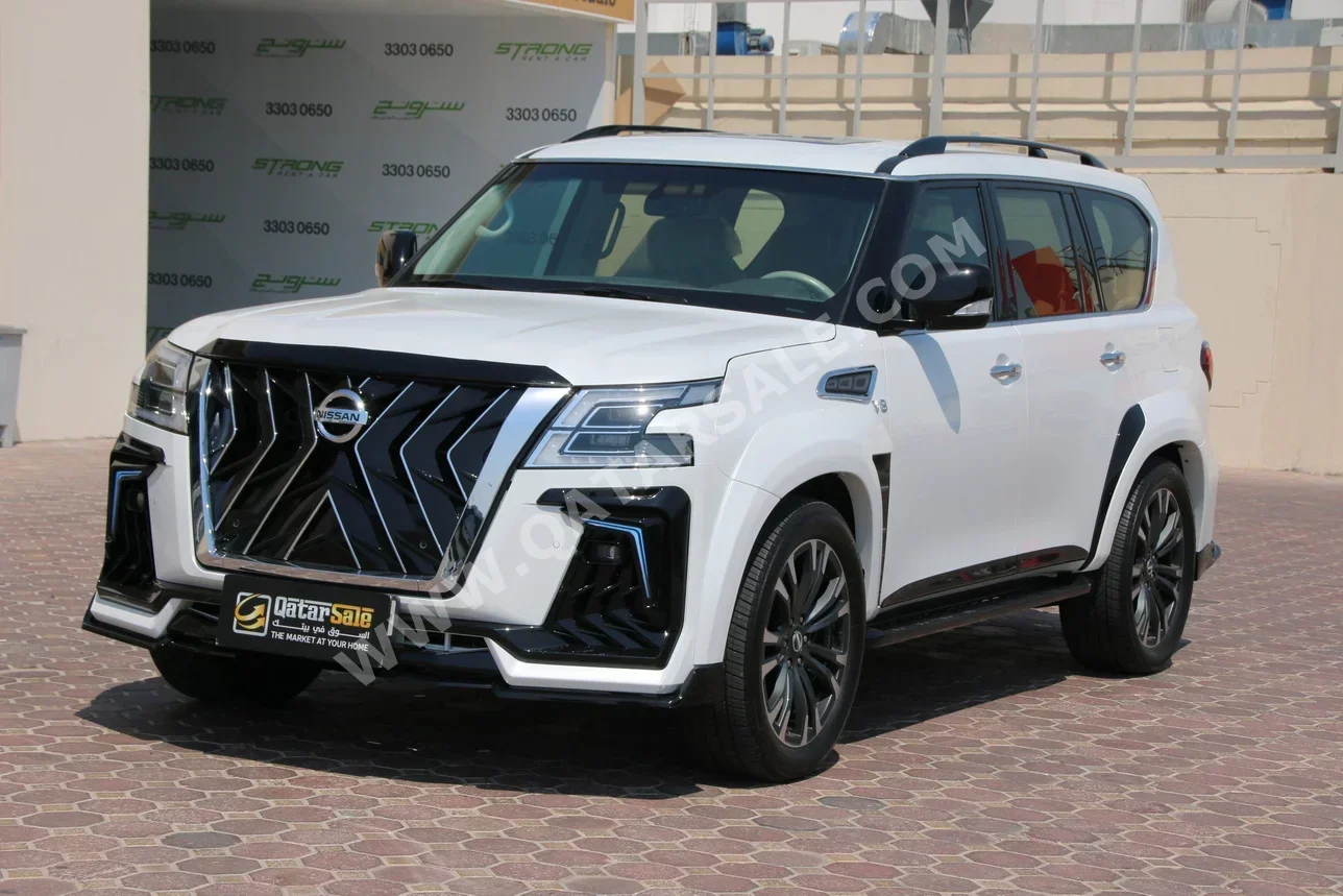 نيسان  باترول  بلاتنيوم  2014  اوتوماتيك  226,000 كم  8 سلندر  دفع رباعي  اس يو في  أبيض