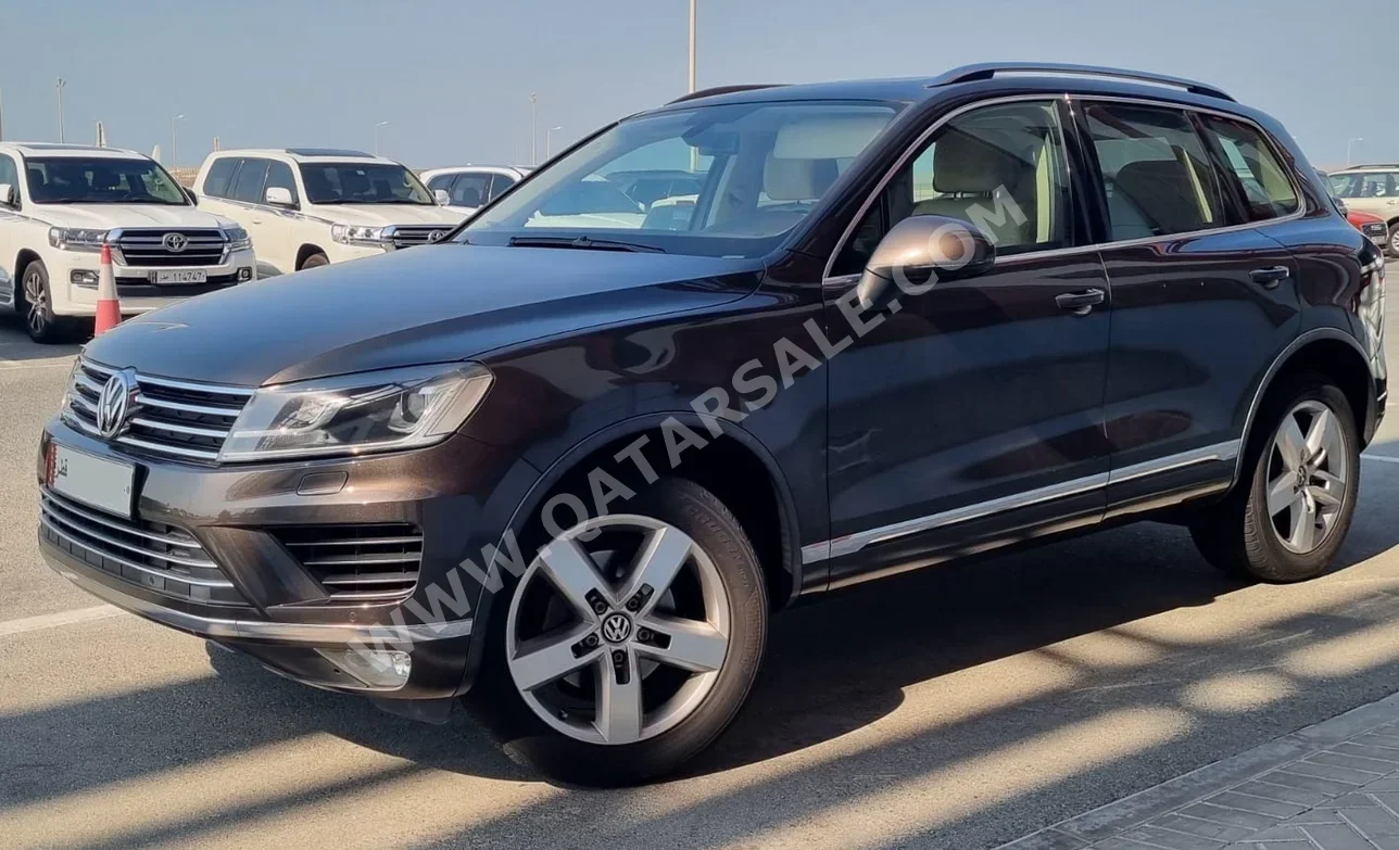 فوكس واغن  طوارق  2015  اوتوماتيك  140,000 كم  6 سلندر  دفع كلي مستمر  اس يو في  بني