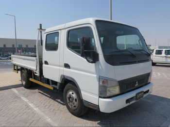Mitsubishi  Fuso Canter  2015  Manual  234,000 Km  6 Cylinder  Rear Wheel Drive (RWD)  Pick Up  White