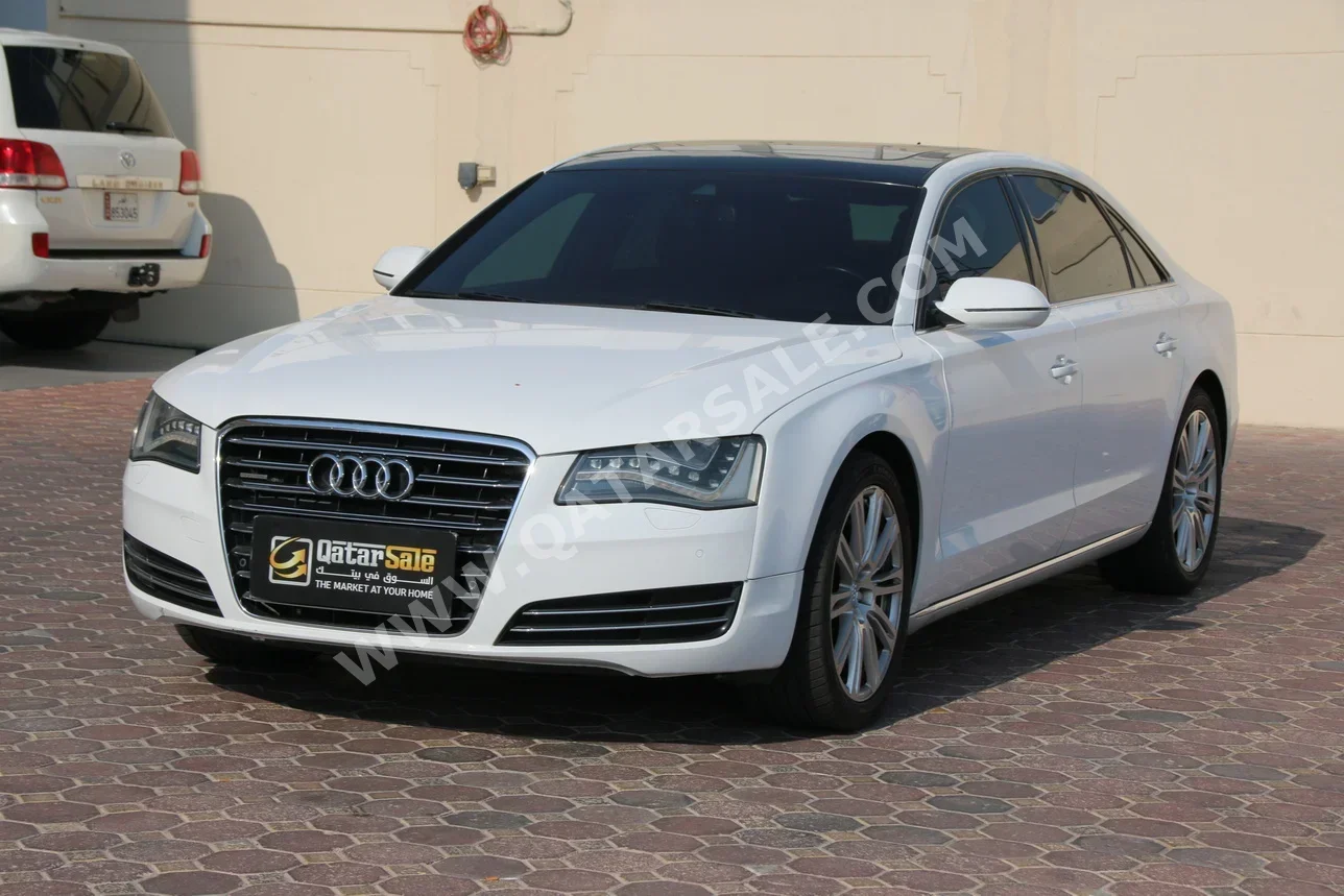 اودي  أي 8  أل  2013  اوتوماتيك  118,000 كم  6 سلندر  دفع كلي مستمر  سيدان  أبيض