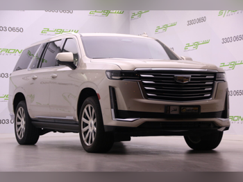 Cadillac  Escalade  Platinum  2021  Automatic  99,150 Km  8 Cylinder  Four Wheel Drive (4WD)  SUV  Gold  With Warranty