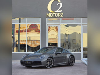Porsche  911  Carrera  2021  Automatic  60,000 Km  6 Cylinder  Rear Wheel Drive (RWD)  Coupe / Sport  Gray  With Warranty