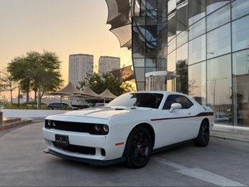 Dodge  Challenger  2014  Automatic  156,000 Km  6 Cylinder  Rear Wheel Drive (RWD)  Coupe / Sport  White