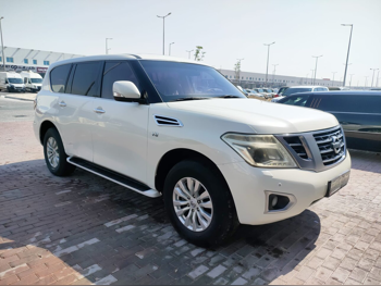 Nissan  Patrol  SE  2015  Automatic  193,000 Km  8 Cylinder  Four Wheel Drive (4WD)  SUV  White