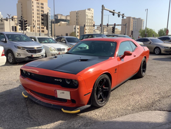 Dodge  Challenger  SRT  2008  Automatic  191,000 Km  8 Cylinder  Rear Wheel Drive (RWD)  Coupe / Sport  Orange