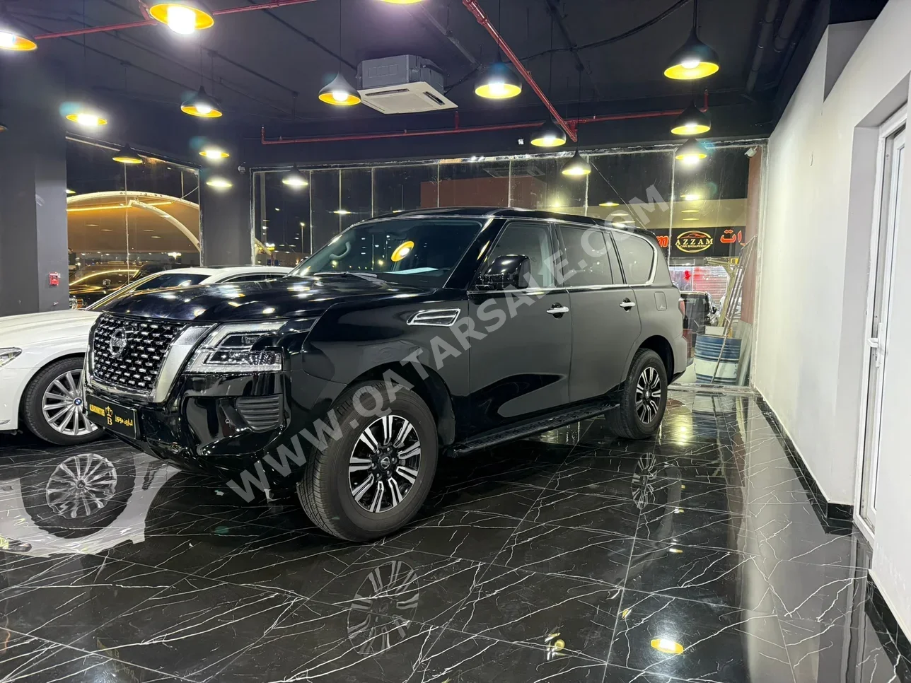 Nissan  Patrol  XE  2020  Automatic  128,000 Km  6 Cylinder  Four Wheel Drive (4WD)  SUV  Black