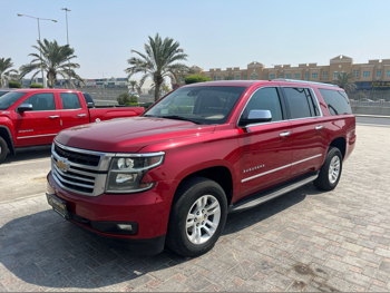 Chevrolet  Suburban  2015  Automatic  219,000 Km  8 Cylinder  Four Wheel Drive (4WD)  SUV  Red