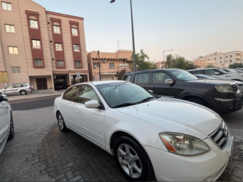 Nissan  Altima  2.5 SV  2006  Automatic  135,000 Km  4 Cylinder  Front Wheel Drive (FWD)  Sedan  White