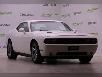 Dodge  Challenger  2014  Automatic  168,000 Km  6 Cylinder  Rear Wheel Drive (RWD)  Coupe / Sport  White