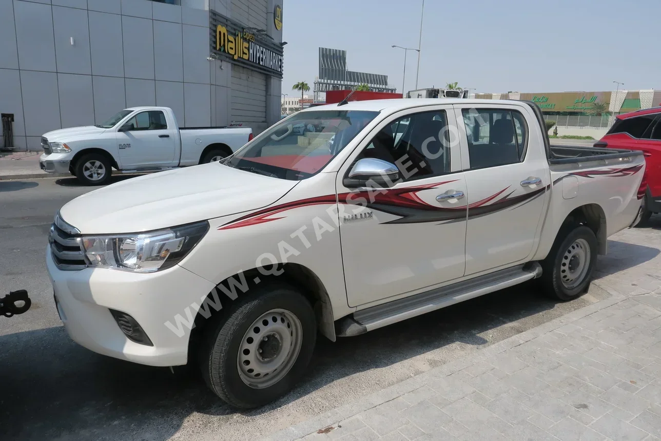 Toyota  Hilux  2023  Automatic  89,000 Km  4 Cylinder  Four Wheel Drive (4WD)  Pick Up  White  With Warranty