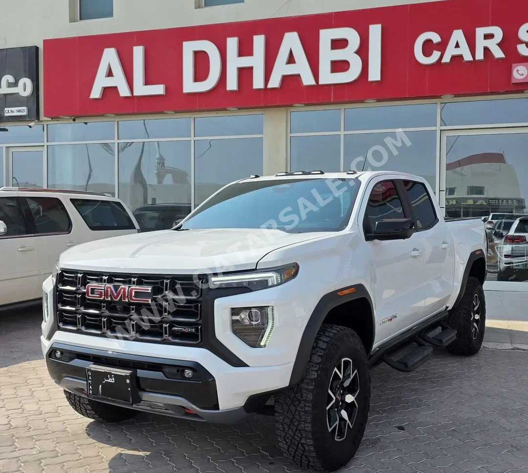 جي ام سي  كانيون  اي تي 4 اكس  2024  اوتوماتيك  18,000 كم  4 سلندر  دفع رباعي  بيكب  أبيض  تحت الضمان