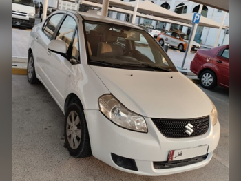 سوزوكي  4 أس أكس  2015  اوتوماتيك  323,000 كم  4 سلندر  سيدان  أبيض