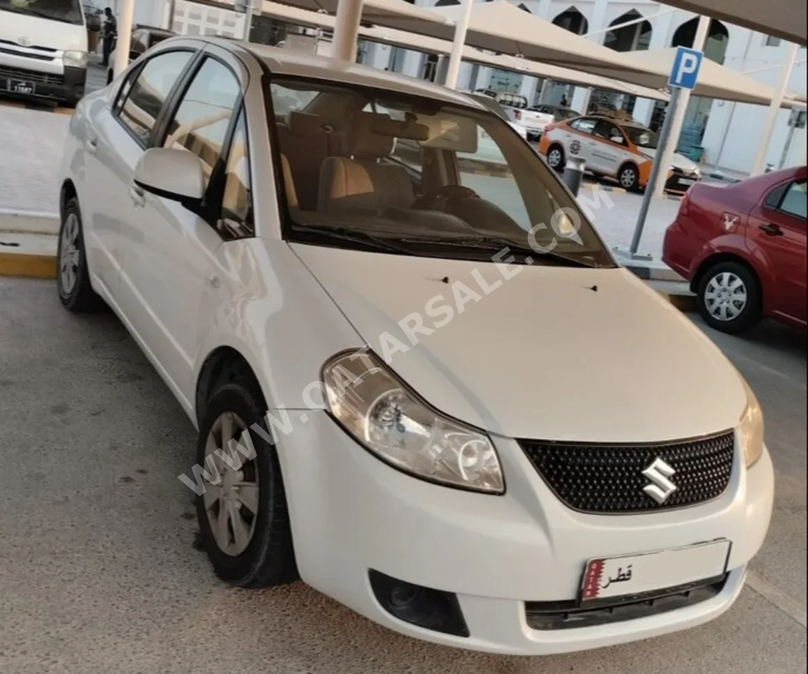 Suzuki  SX4  2015  Automatic  323,000 Km  4 Cylinder  Sedan  White