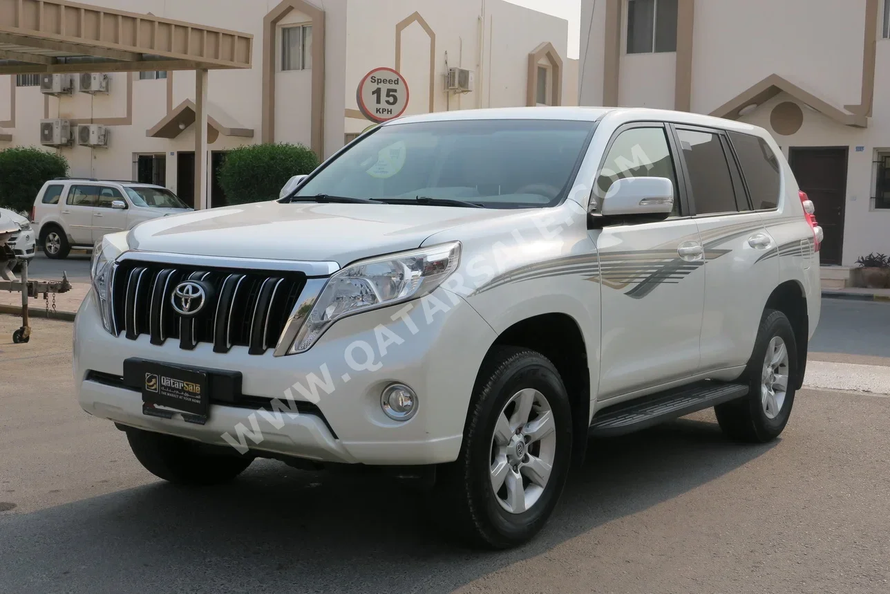 Toyota  Prado  TXL  2014  Automatic  86,000 Km  4 Cylinder  Four Wheel Drive (4WD)  SUV  White