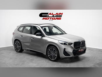 BMW  IX  1 XDrive  2023  Automatic  48 Km  0 Cylinder  All Wheel Drive (AWD)  SUV  Silver