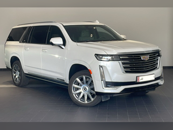 Cadillac  Escalade  Platinum  2024  Automatic  13,000 Km  8 Cylinder  Four Wheel Drive (4WD)  SUV  White  With Warranty