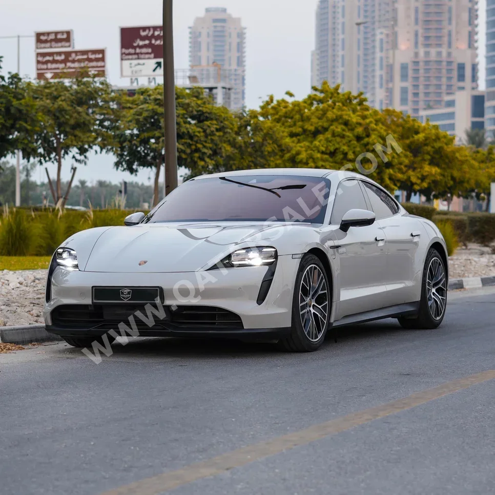 Porsche  Taycan  2022  Automatic  80,000 Km  6 Cylinder  All Wheel Drive (AWD)  Coupe / Sport  Beige  With Warranty
