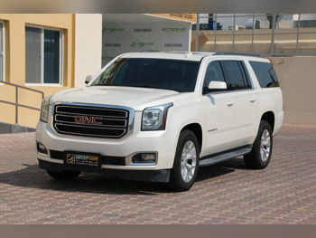 GMC  Yukon  XL SLT  2015  Automatic  204,000 Km  8 Cylinder  Four Wheel Drive (4WD)  SUV  Pearl