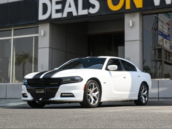 Dodge  Charger  R/T Plus  2015  Automatic  105,000 Km  8 Cylinder  Rear Wheel Drive (RWD)  Sedan  White