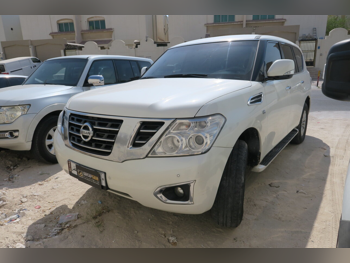 نيسان  باترول  أكس أي  2016  اوتوماتيك  210,000 كم  6 سلندر  دفع رباعي  اس يو في  أبيض