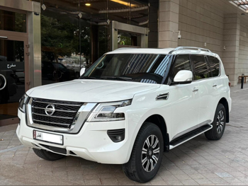 Nissan  Patrol  Titanium  2020  Automatic  118,000 Km  6 Cylinder  Four Wheel Drive (4WD)  SUV  White  With Warranty