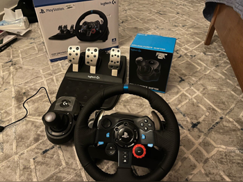 ملحقات اجهزة العاب الفيديو عجلة القيادة مع مغير السرع  - لوجيتك  - جي 29  - أسود