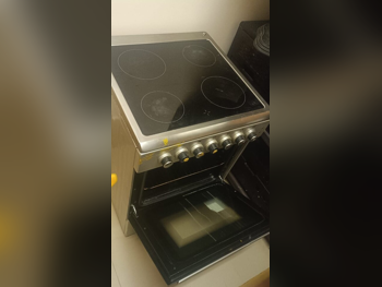 AFTRON /  Oven / Microwave Combination /  Electric And Gas  Chrome