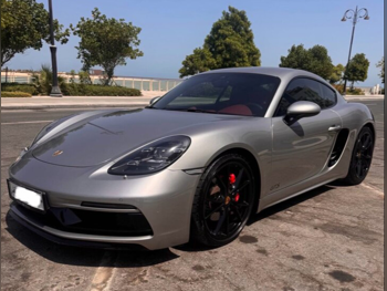 Porsche  Cayman  718 GTS  2019  Automatic  48,000 Km  4 Cylinder  Rear Wheel Drive (RWD)  Coupe / Sport  Silver  With Warranty