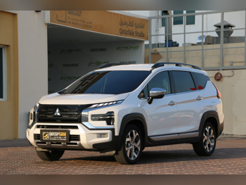 Mitsubishi  Xpander  Cross  2024  Automatic  80,000 Km  4 Cylinder  Four Wheel Drive (4WD)  SUV  White  With Warranty