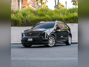 Cadillac  XT4  PREMIUM LUXURY  2023  Automatic  58,000 Km  4 Cylinder  All Wheel Drive (AWD)  SUV  Black  With Warranty