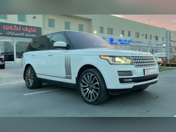 Land Rover  Range Rover  Vogue SE  2014  Automatic  176,000 Km  8 Cylinder  Four Wheel Drive (4WD)  SUV  White