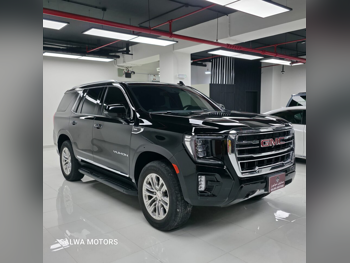 GMC  Yukon  SLT  2023  Automatic  43,000 Km  8 Cylinder  Four Wheel Drive (4WD)  SUV  Black  With Warranty