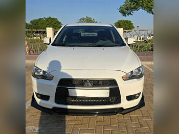 ميتسوبيشي  لانسر  اي اكس  2015  اوتوماتيك  76,000 كم  4 سلندر  سحب امامي  سيدان  أبيض