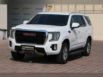 جي ام سي  يوكون  اس ال اي  2021  اوتوماتيك  42,000 كم  8 سلندر  دفع خلفي  اس يو في  أبيض  تحت الضمان