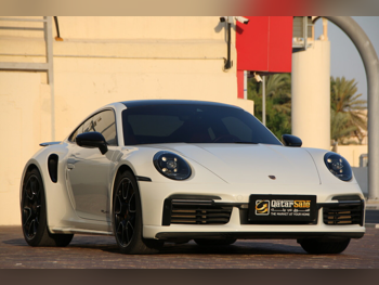 Porsche  911  Turbo  2021  Automatic  42,000 Km  6 Cylinder  Rear Wheel Drive (RWD)  Coupe / Sport  White  With Warranty