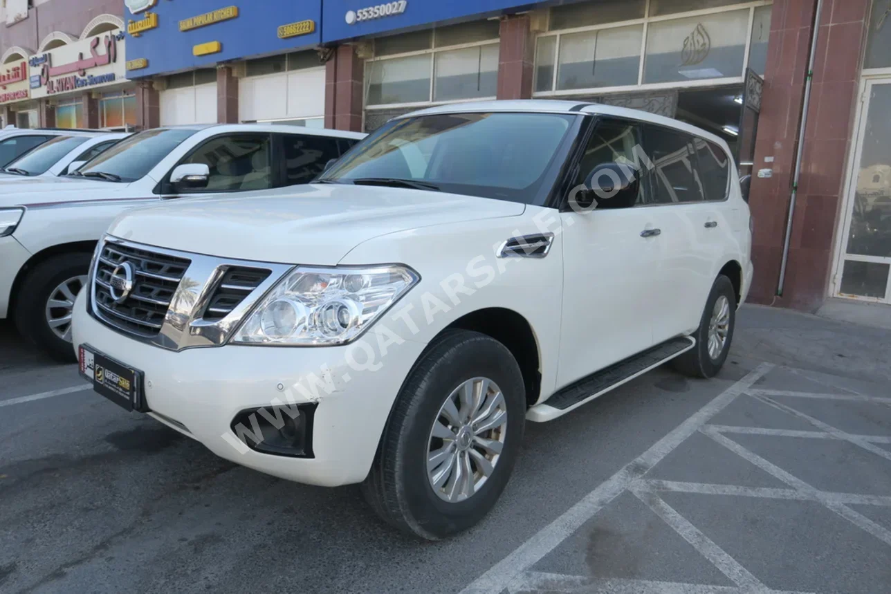 نيسان  باترول  أكس أي  2019  اوتوماتيك  202,000 كم  6 سلندر  دفع رباعي  اس يو في  أبيض